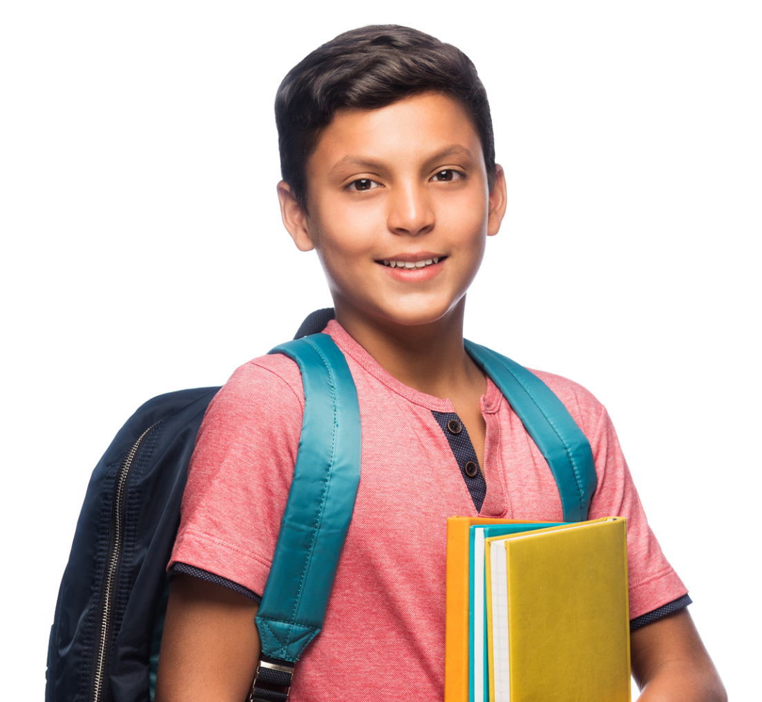 A boy looks into the camera while holding some books and a backpack